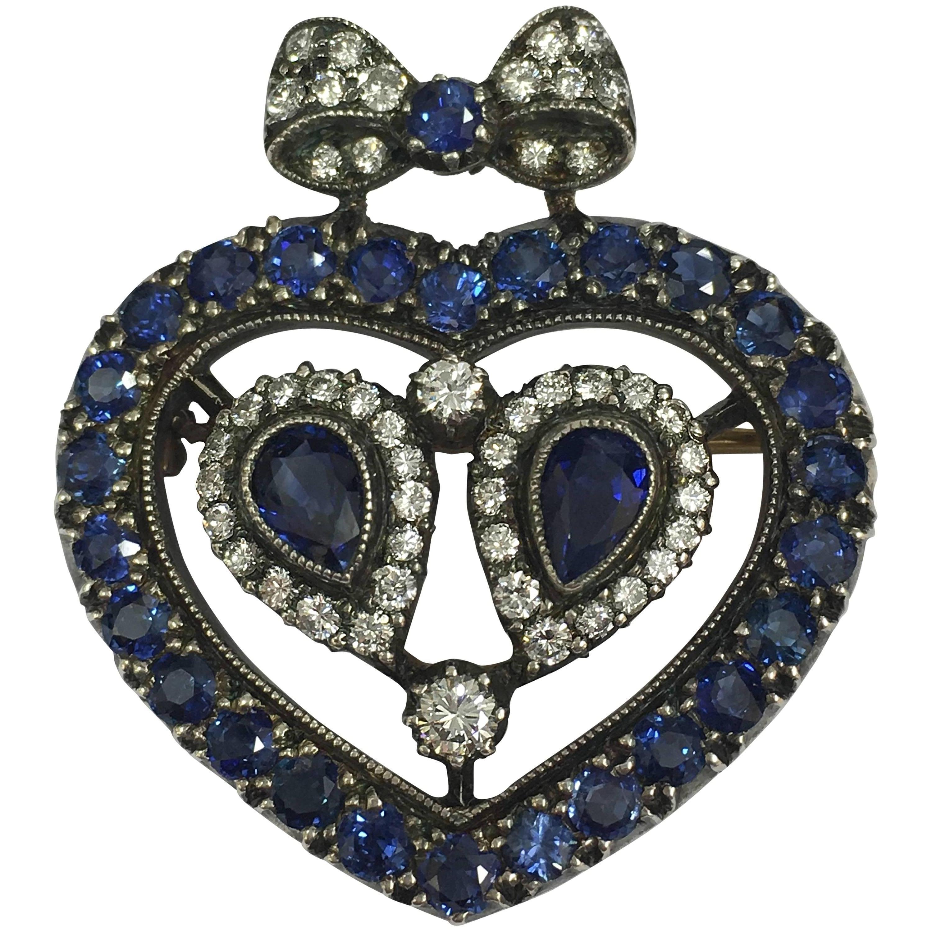 Love heart sapphire and diamond bow brooch/pendant For Sale