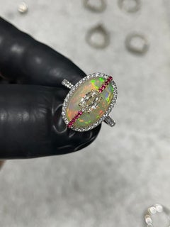 Opal Aurora - Fancy Step Cut Oval Diamond set on Ethopian Opal in Designer Ring