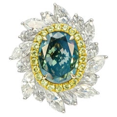 Aurora Verde - Anello di design con diamante colorato e diamanti bianchi, in oro 18 carati