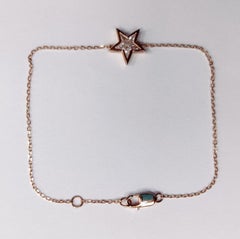 Starfire-Armband – Armband aus 18-karätigem Gold mit einer Kette, in die ein Diamant in Sternform eingefasst ist