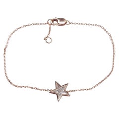 Starfire-Armband – Armband aus 18-karätigem Gold mit einer Kette, in die ein Diamant in Sternform eingefasst ist