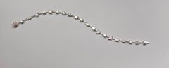 Pristine Constellation – GIA-zertifiziertes Diamantarmband mit Diamanten in verschiedenen Schliffformen, gefasst in 18 Karat