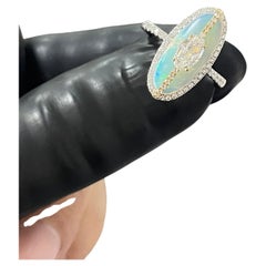 Opal Horizon - Step Cut Diamond set over an Australian Opal in Handmade Ring