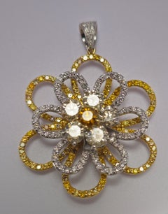 Golden Ember - White & Yellow Diamonds set in this flower style Pendent in 18K