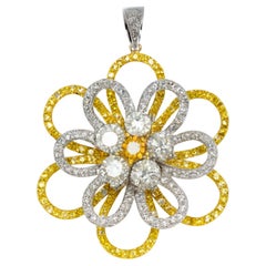Golden Ember - White & Yellow Diamonds set in this flower style Pendent in 18K