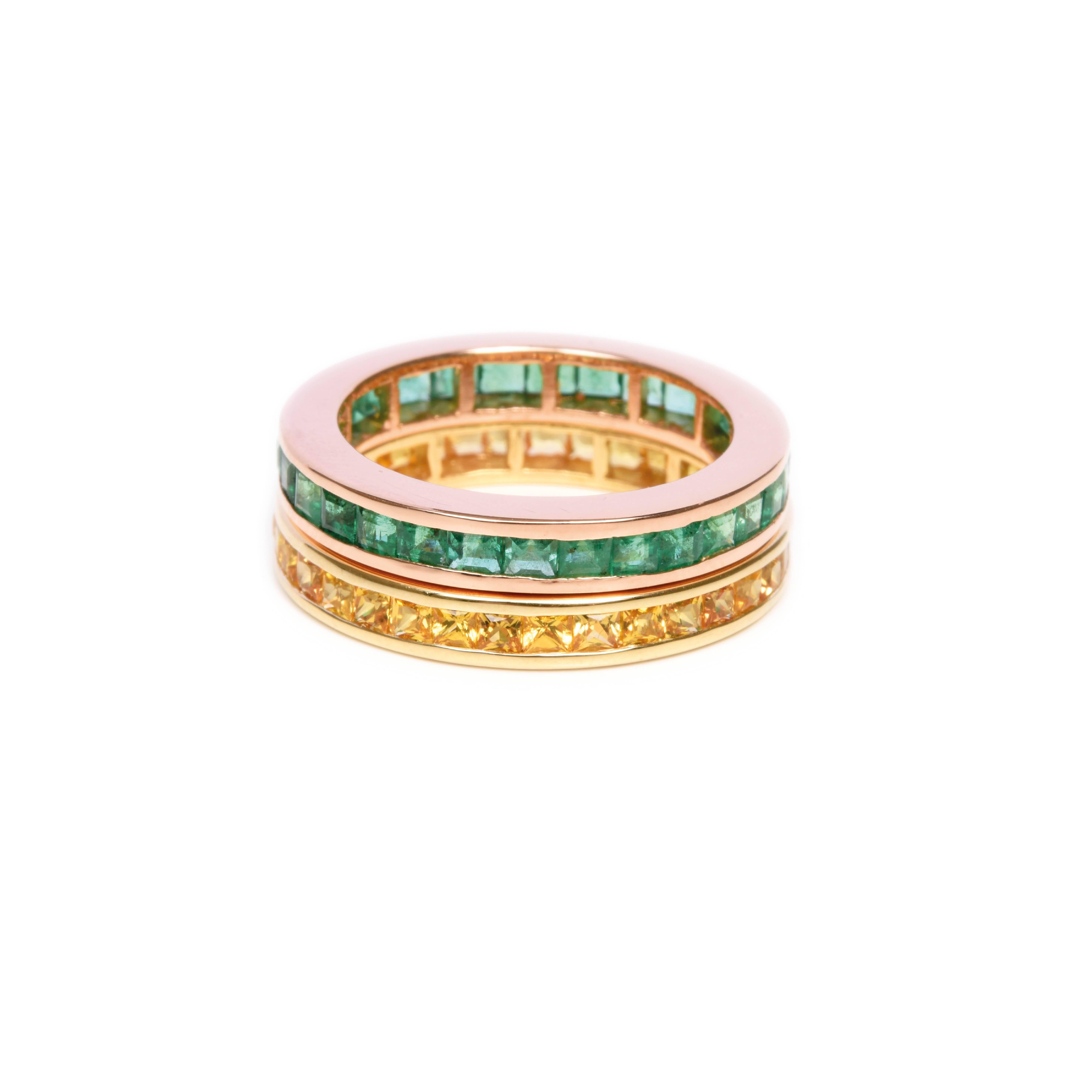 Eternity band ring of invisibly set emeralds in 18 karat yellow or rose gold. 

The delicate band is set with emeralds all the way around to signify eternal love. Crafted in Italy to specified band size.  This bespoke jewel is ready to ship within