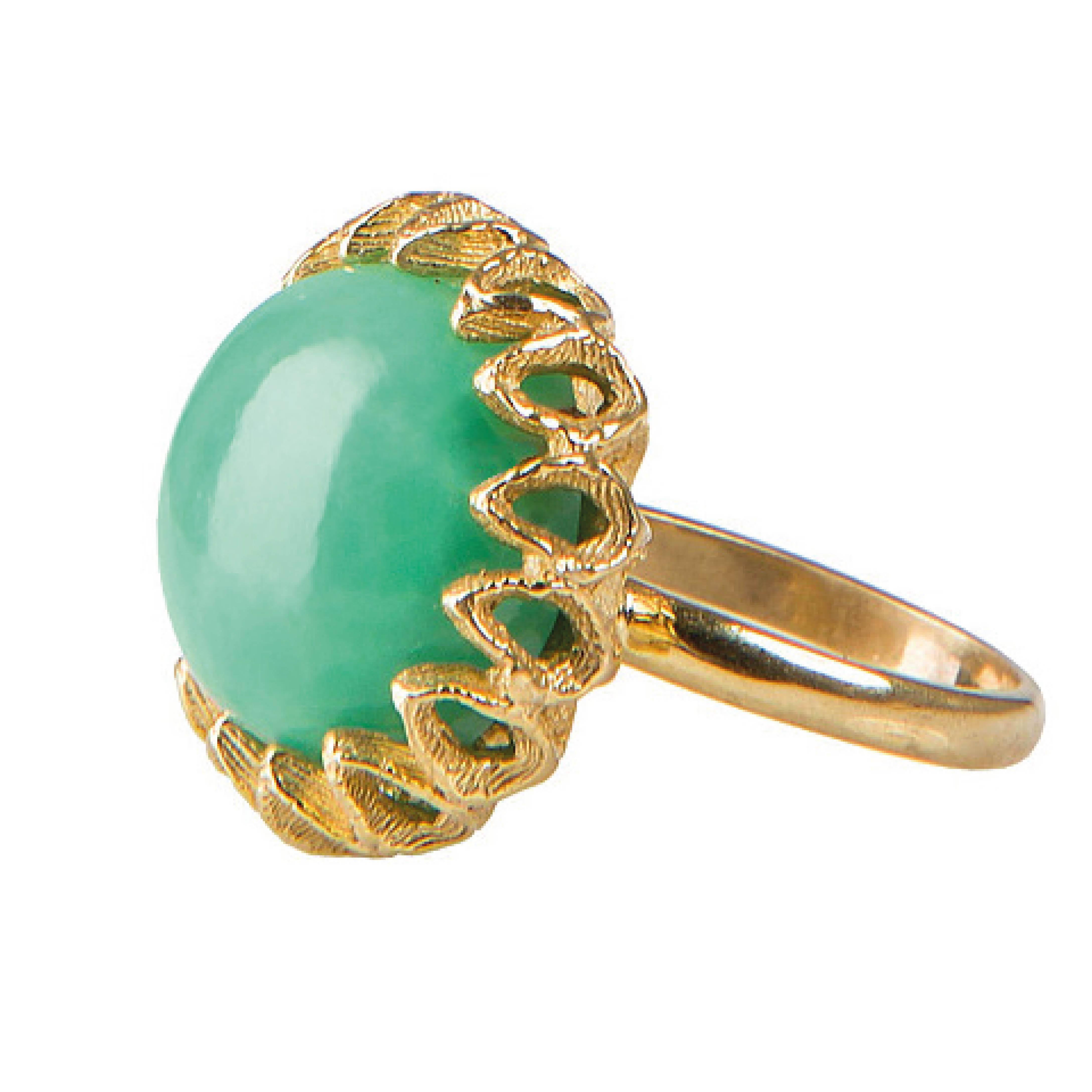 The finest 16-carat chrysoprase gemstone set in a handmade 18kt gold plated band. This beautiful stone is sourced from ethical mines in Namibia, Africa; set and finished by hand in England.

US size 6 1/2 / UK size N. This unique piece is