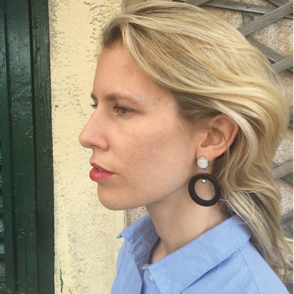 These finely crafted African moonstone and cow horn earrings are carved by artisans in Kenya, East Africa and finished to the finest quality in London.

Handmade from natural materials with silver pin-backs for pierced ears. Please note that slight