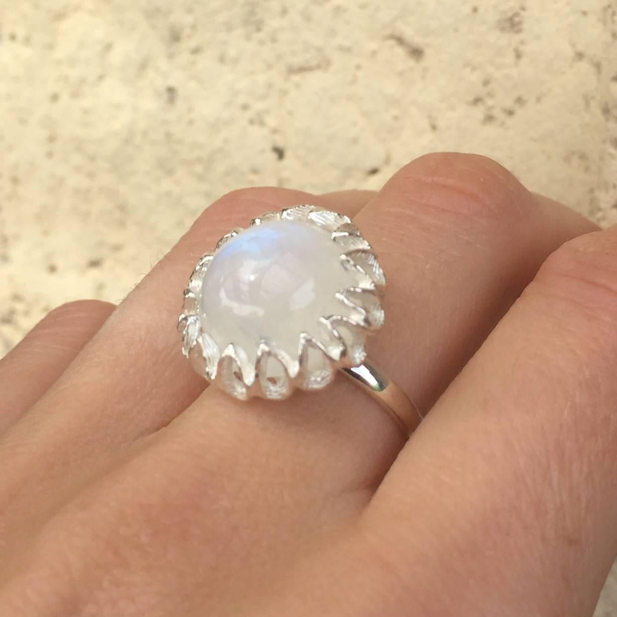 This bespoke ring is set with the finest moonstone. The handmade silver band is available in a variation of band sizes. 

The Fouché collection is designed by Claire Fouché, former couture jewellery designer for Fabergé.  