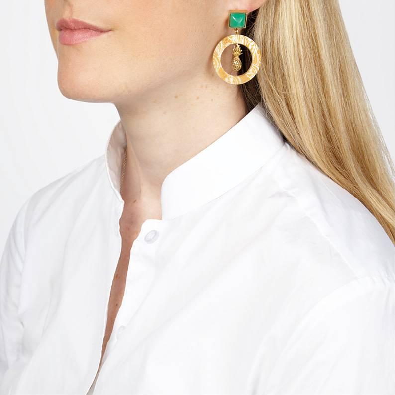 These unusual and finely crafted chrysoprase gemstone and African cow horn earrings are handmade by artisans in Kenya and finished by hand in London. 

Handmade from natural materials with silver pin-backs for pierced ears. Please note that horn