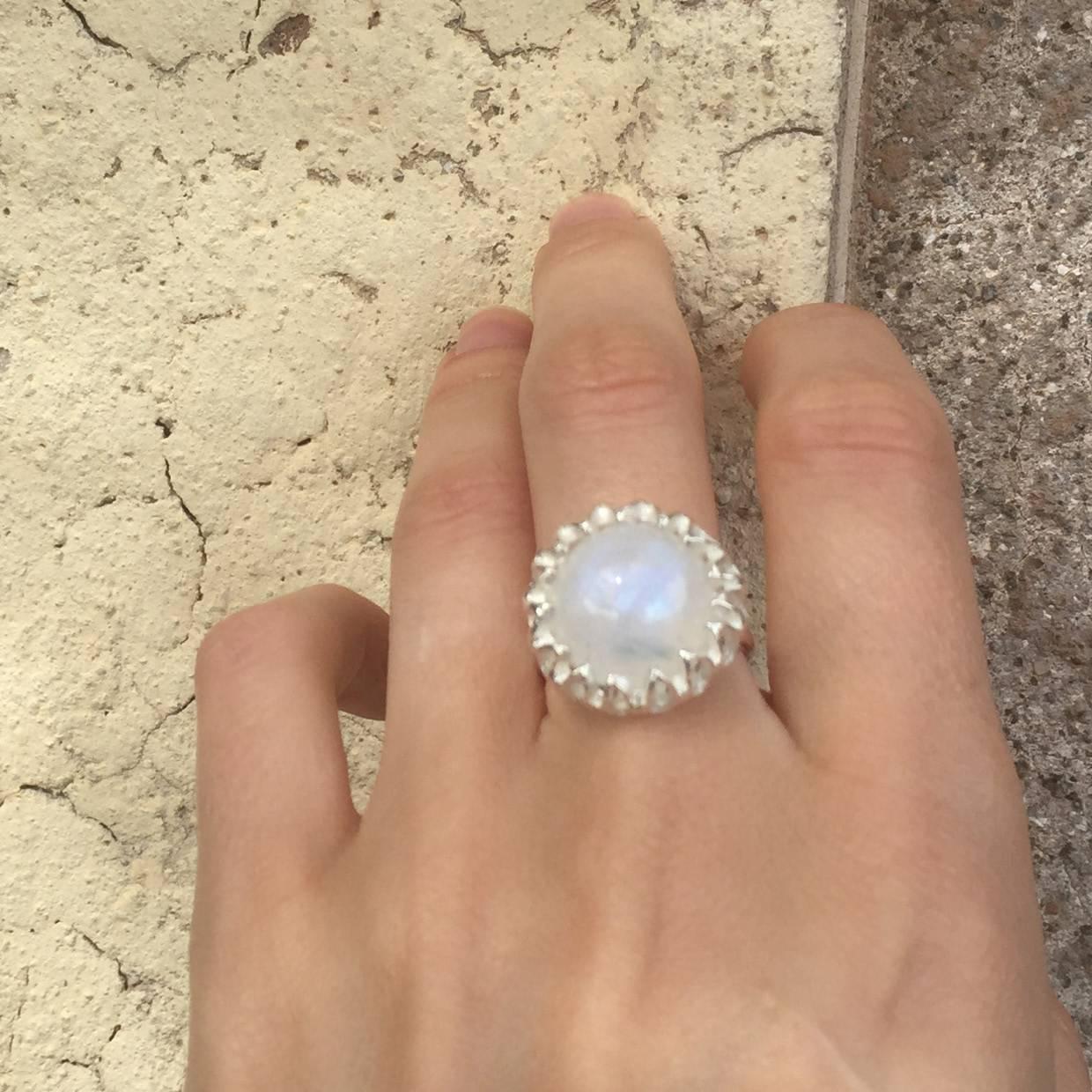 This bespoke ring is set with the finest moonstone on a handmade silver band. US size 7 1/4

The Fouché collection is designed by Claire Fouché, former couture jewellery designer for Fabergé.