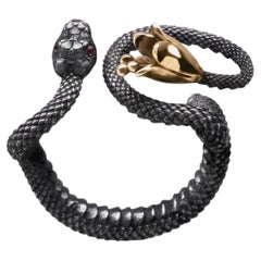 Red Sapphire Snake Ring in Sterling Silver, Ruthenium and Gilding