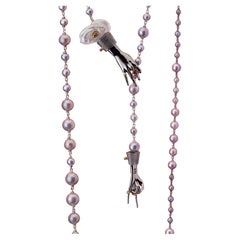Grey Cultured Pearl Sautoir with Silver Hand Pendants and Gemstones