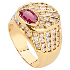 Signetring für den kleinen Finger aus 18-Karat-Gold mit ovalem Rubin und rundem Diamanten
