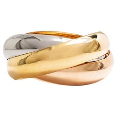Bracelet vintage « Trinity » extra-large et rare de Cartier, en or tricolore, années 1980