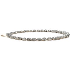Collier « Rivière » ancien en argent sur or, serti de diamants pour un total de 36,45 carats, vers les années 1890