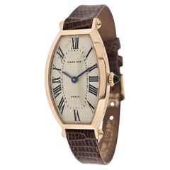 Cartier Paris Rose Gold Tonneau shaped watch, curves on the wrist. Circa 1990's