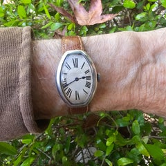 Tiffany & Co. Antique Silver Tonneau watch 35x26mm center lug case, Circa 1920's