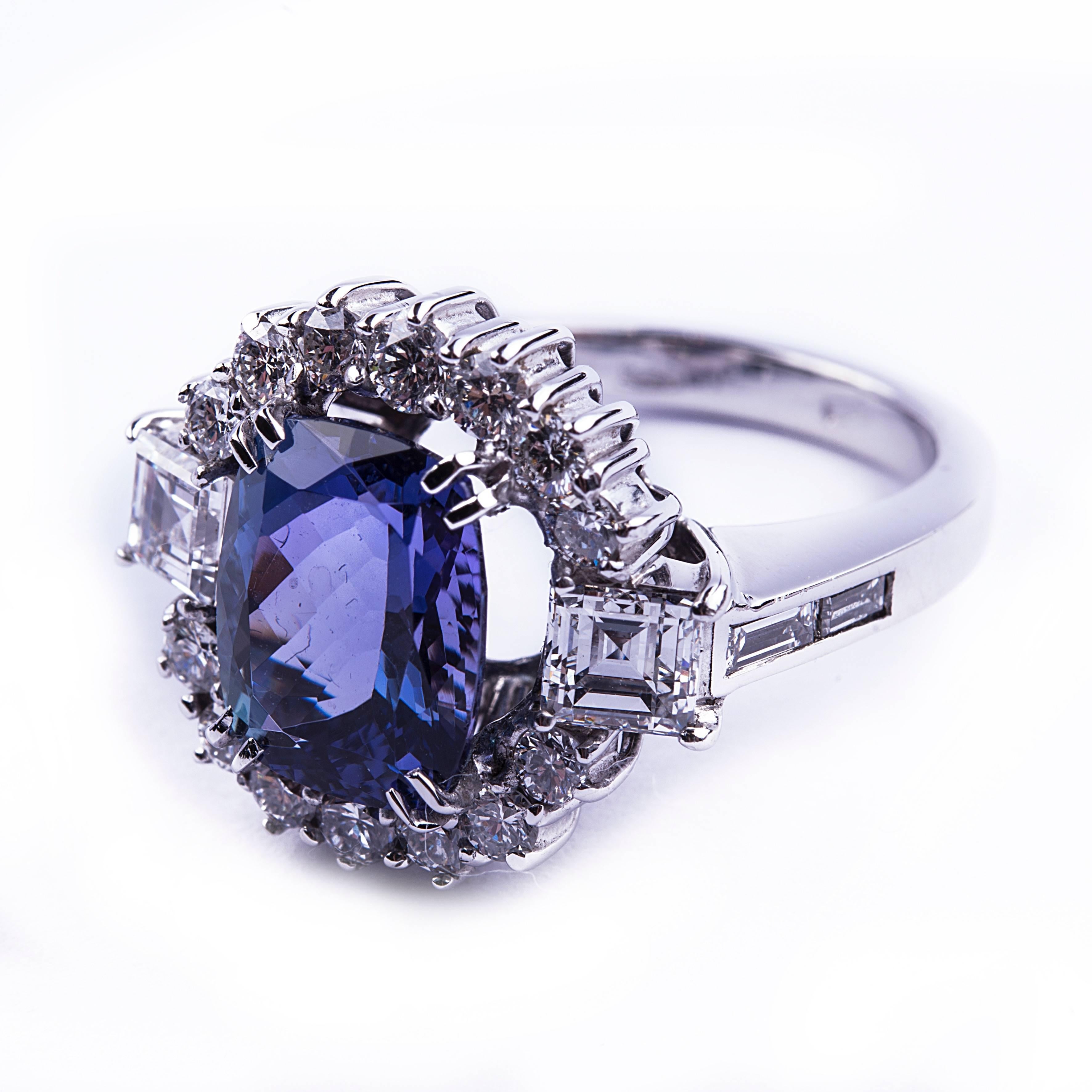 A 18k gold elegant ring featuring a 4.04 carat cushion cut tanzanite and 2.00 carat circa of diamonds.