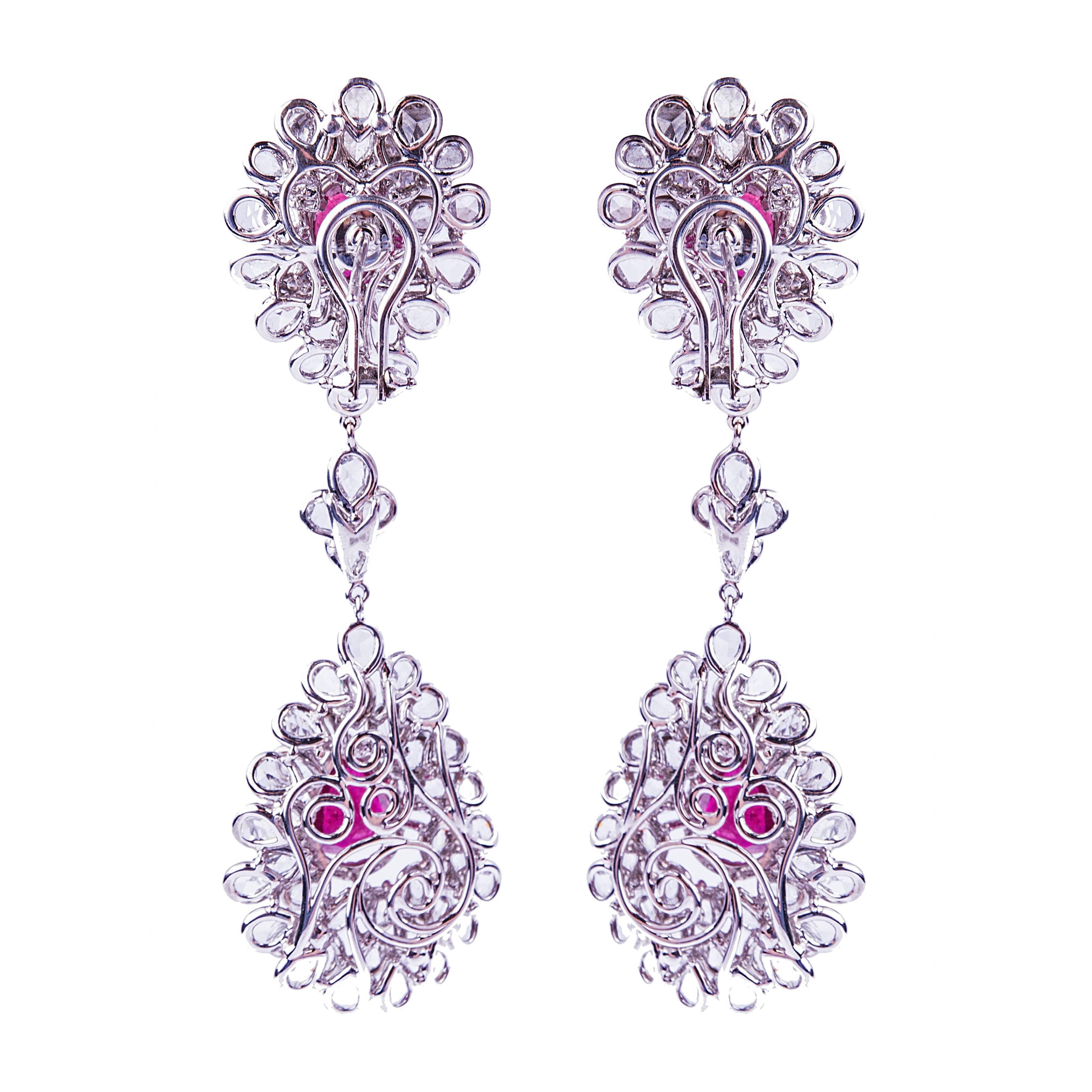 Ruby and Rose Cut Diamond earrings

Rubies: 9.73 ct
Diamonds: 12.68 ct
