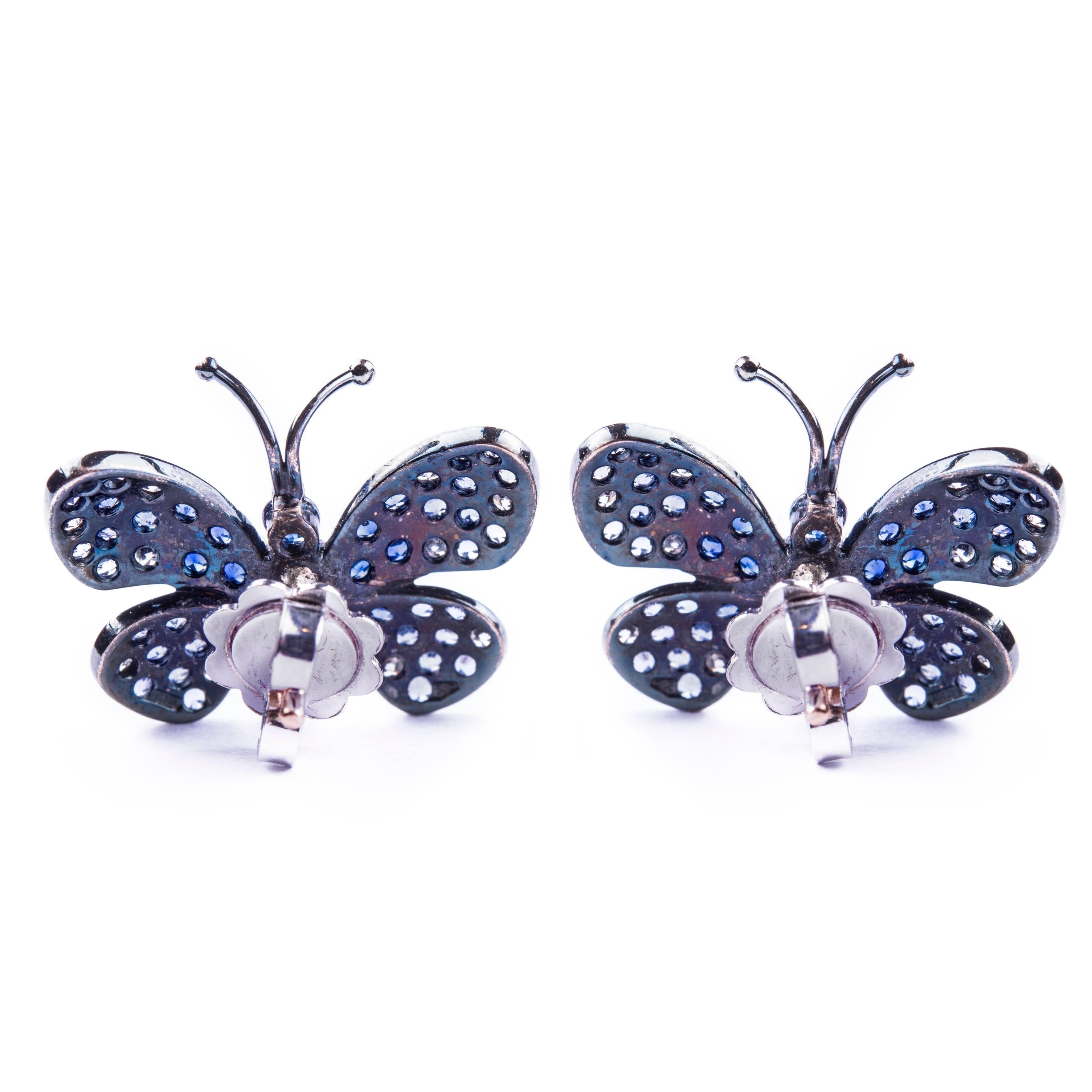A lovely and sparkling pair of sapphire and diamond butterfly stud earrings