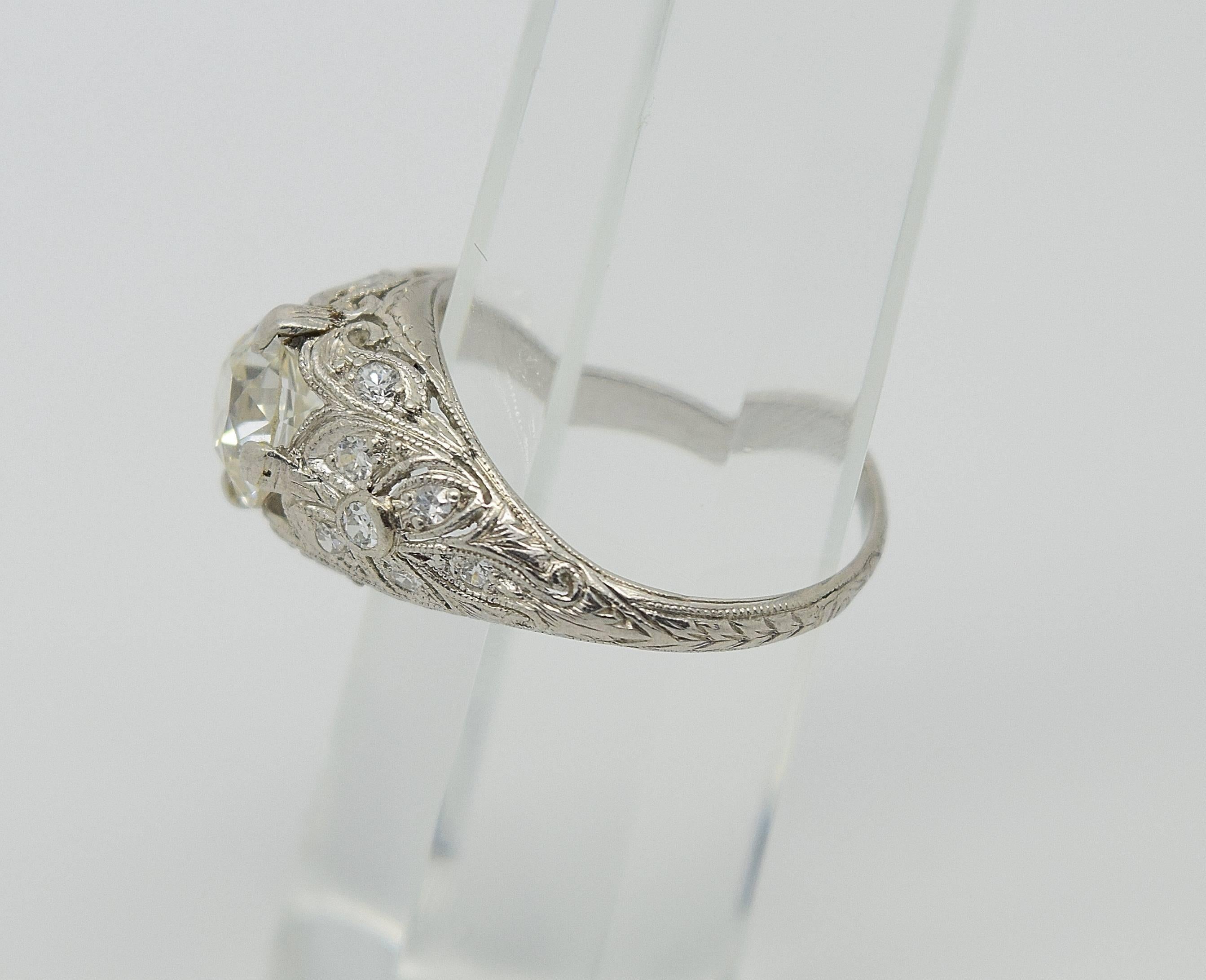 Intricate Art Deco Old European cut diamond ring set in platinum. The center diamond is approximately 1.20ct and is I/J color and VS clarity. The ring has fantastic filigree and miligrain design and is a very desirable engagement ring style. The