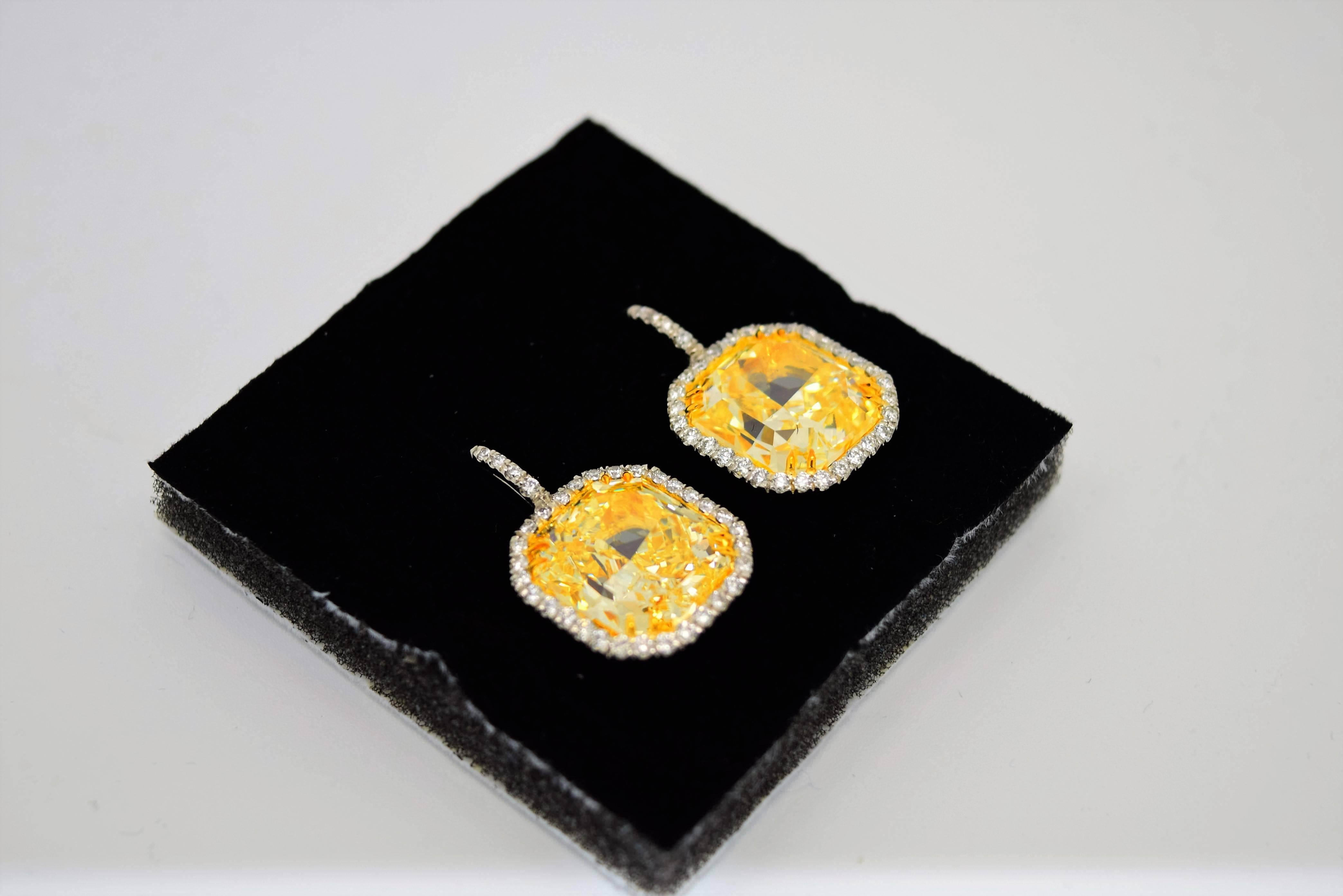 Women's Important 24.33 Carats GIA Cert Fancy Yellow Radiant Cut Diamonds Earrings