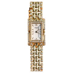 Fred Paris Vintage Ladies Watch in 18 Karat Yellow Gold with Diamond Set Dial
