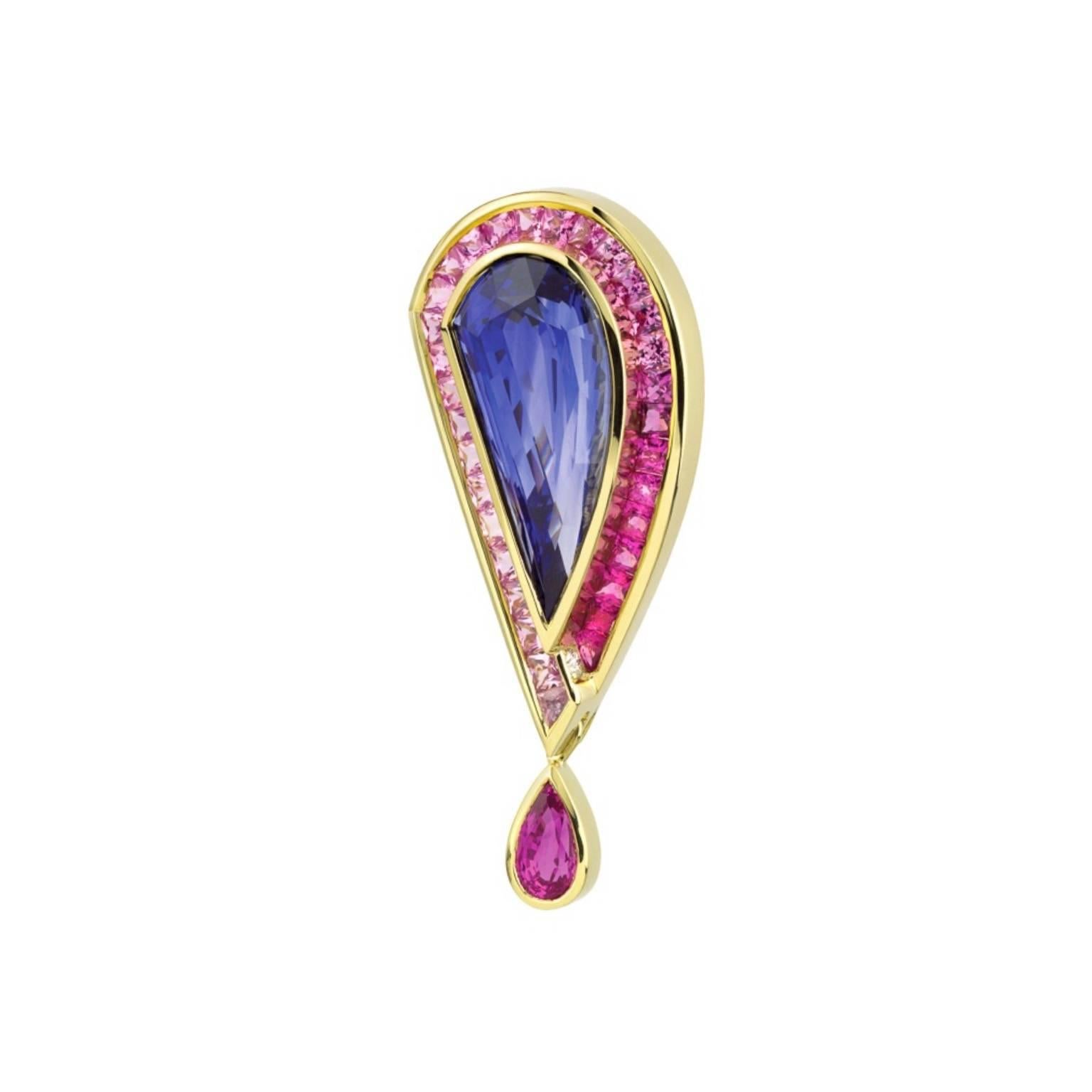 This  one of a kind, Susan Sader brooch/ Pendant features a 17.29 ct. fancy cut, Ceylon Blue Sapphire. With 32 square cut Vietnamese Pink Sapphire for 4.26 ct. tw.  Dolor graduating from light to vivid pink. The dangle at the end of the brooch Is