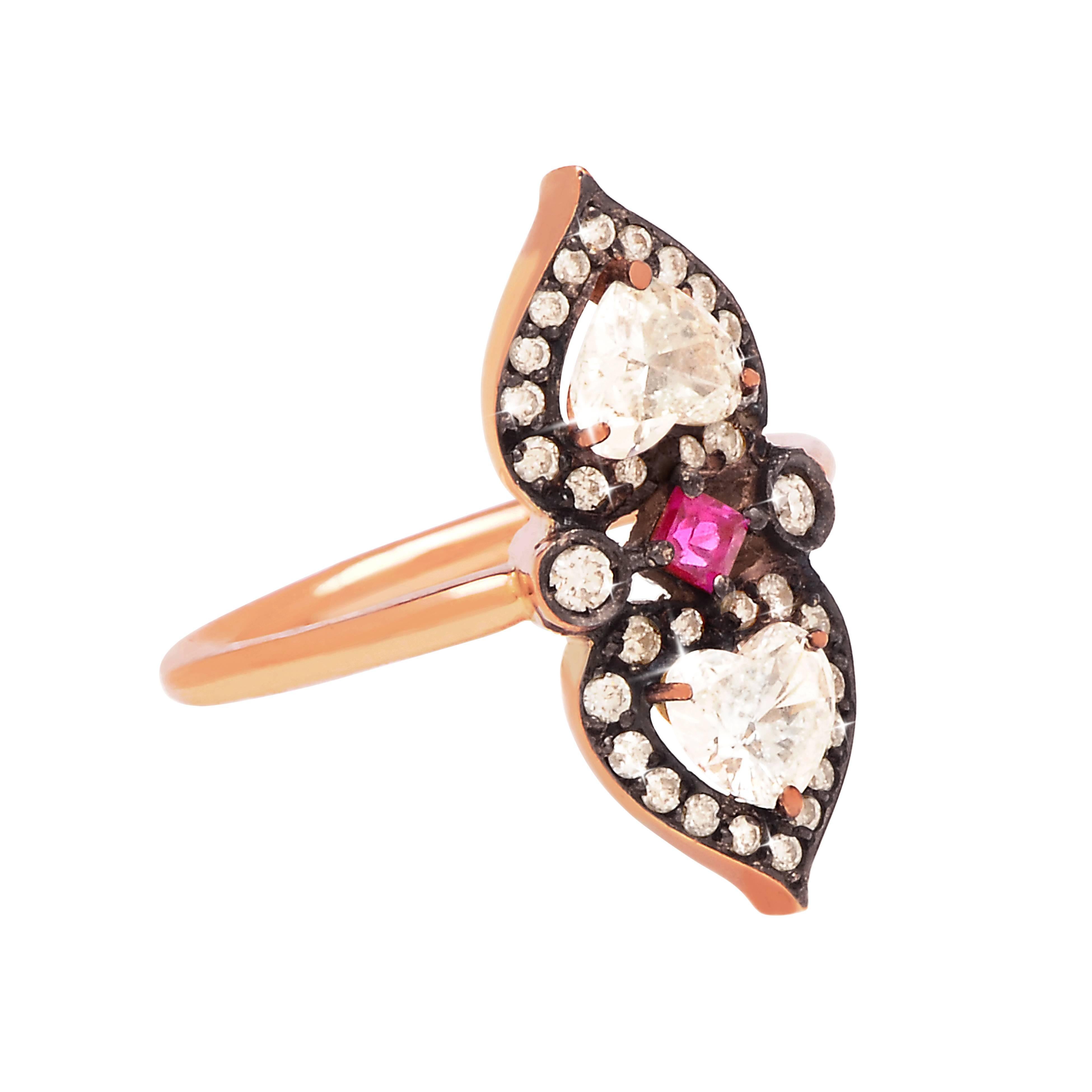Sabine Getty ‘Heart to Heart’ ring in 18k rose gold set with two heart shaped diamonds and a ruby
Diamond: 0,71 Ruby: 0,08

Available in sizes 47 and 46.5 - can be re-sized.

Relic was the debut collection by Sabine Getty launched in September