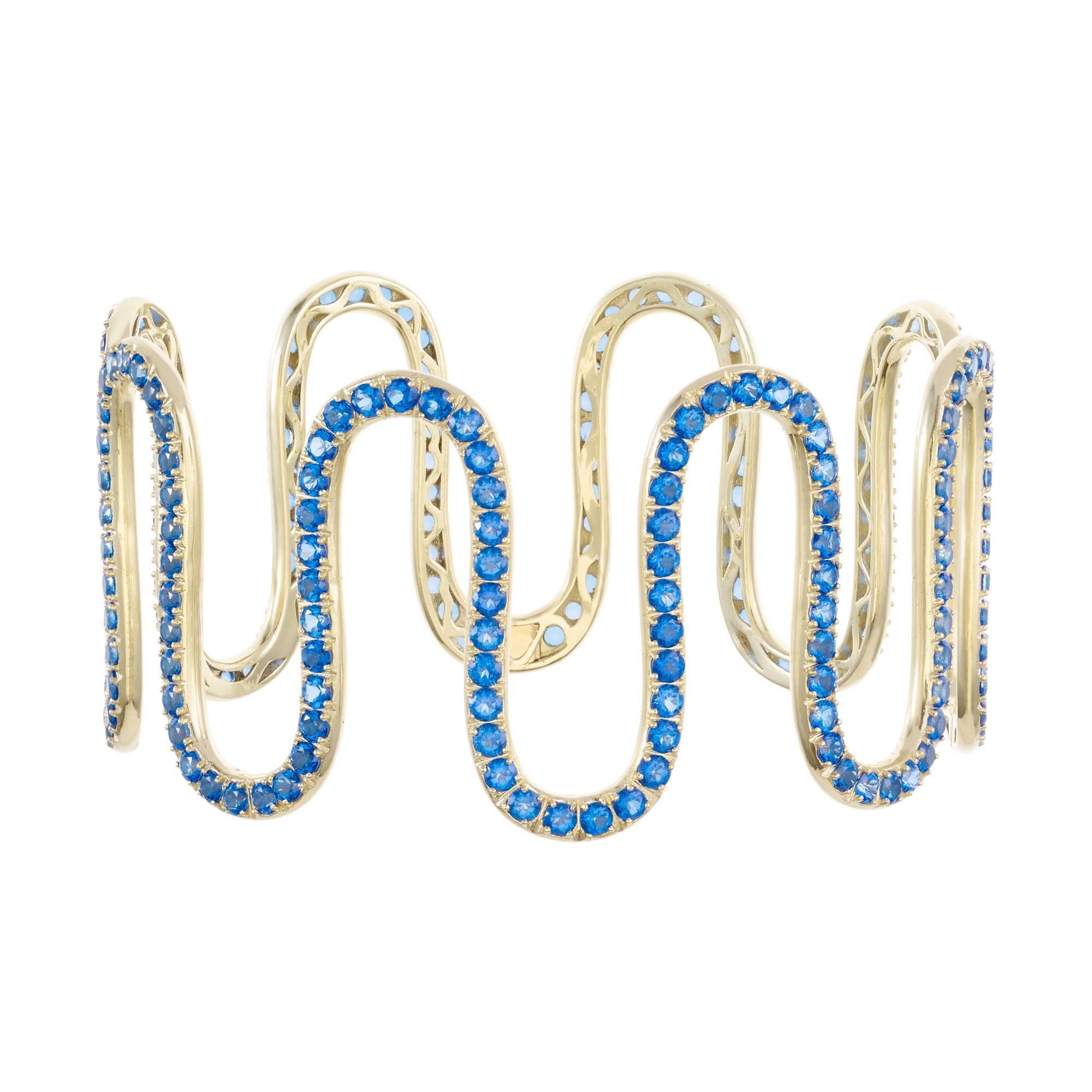 *MADE TO ORDER - 5 WEEK LEAD TIME*

Sabine Getty wiggly choker in 18k yellow gold set with blue topaz.

Topaz: 66.70ct

Yellow, pink, green and blue. Four colours inspired by the Memphis Group, the kookiest of Made in Italy designers, for a
