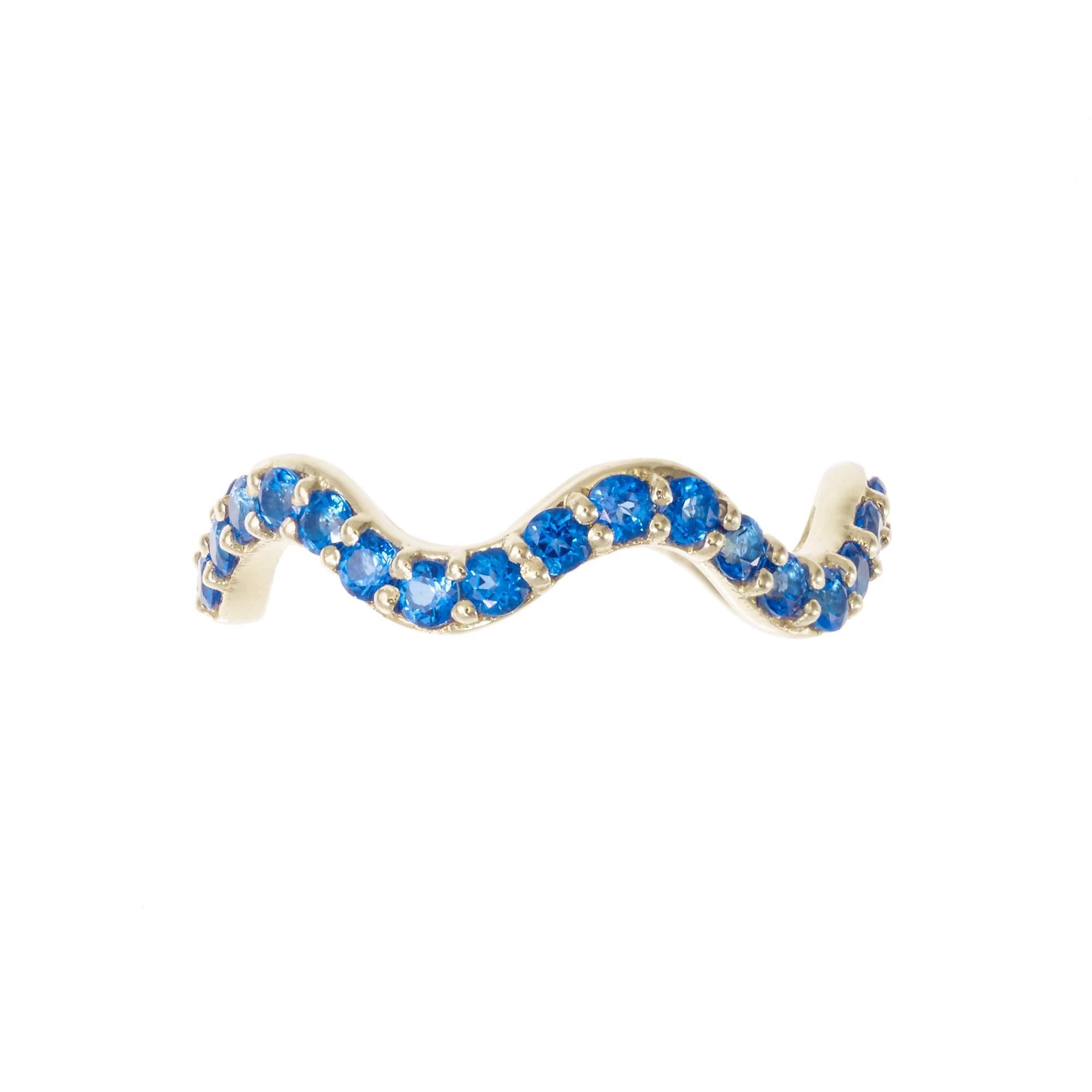 *MADE TO ORDER - 5 WEEK LEAD TIME*

Sabine Getty wiggly band in 18k yellow gold set with blue topaz

Topaz: 1.32ct

Yellow, pink, green and blue. Four colours inspired by the Memphis Group, the kookiest of Made in Italy designers, for a