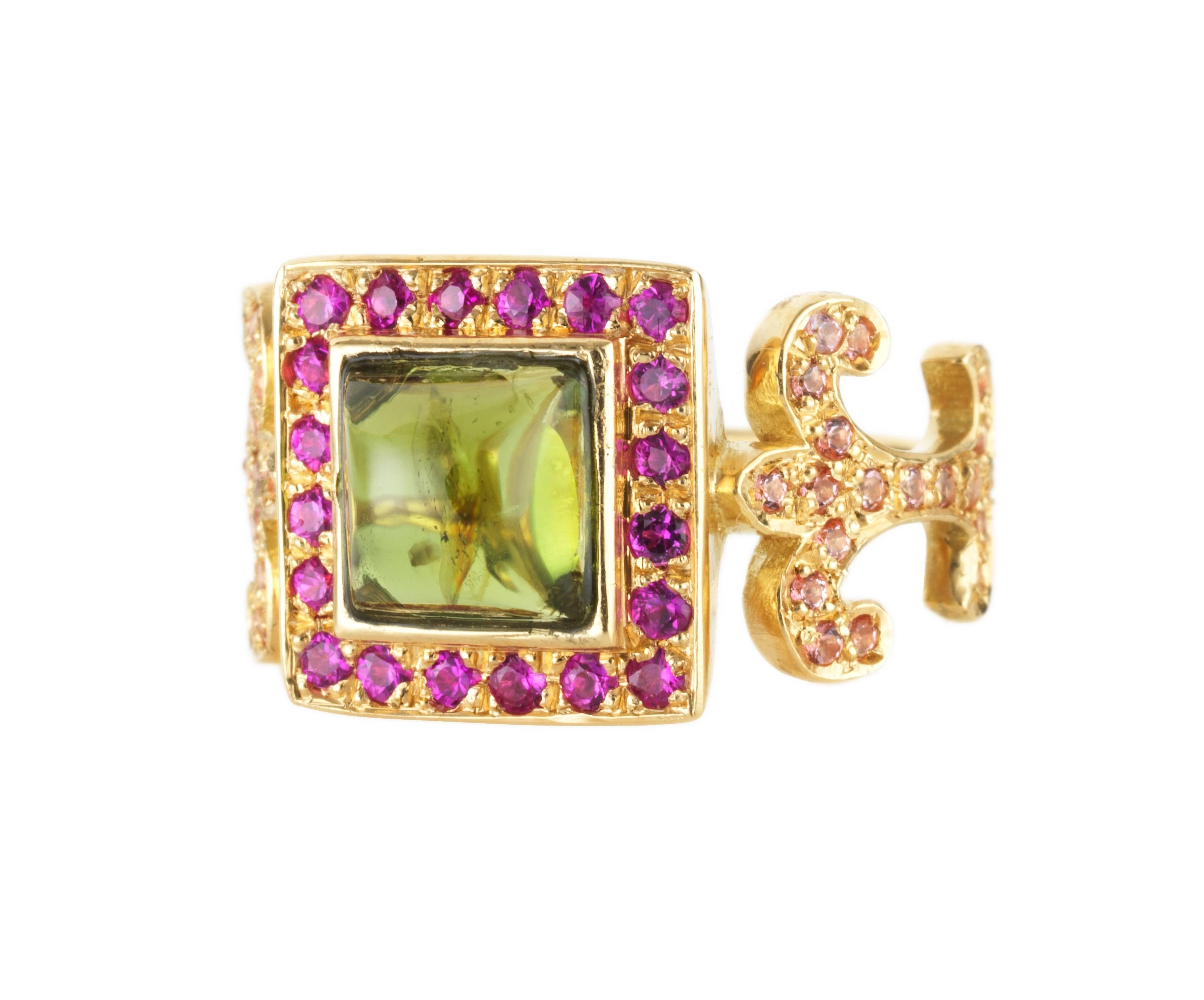 18kt yellow gold Sabine Getty Prospero Domi Verde ring set with green tourmaline, pink sapphire and pink topaz.

Sapphire: 0.30 Topaz: 0.40

Available in sizes 46, 46.5, 55.5. Can be resized. 

The beautiful Prospero collection takes a strong