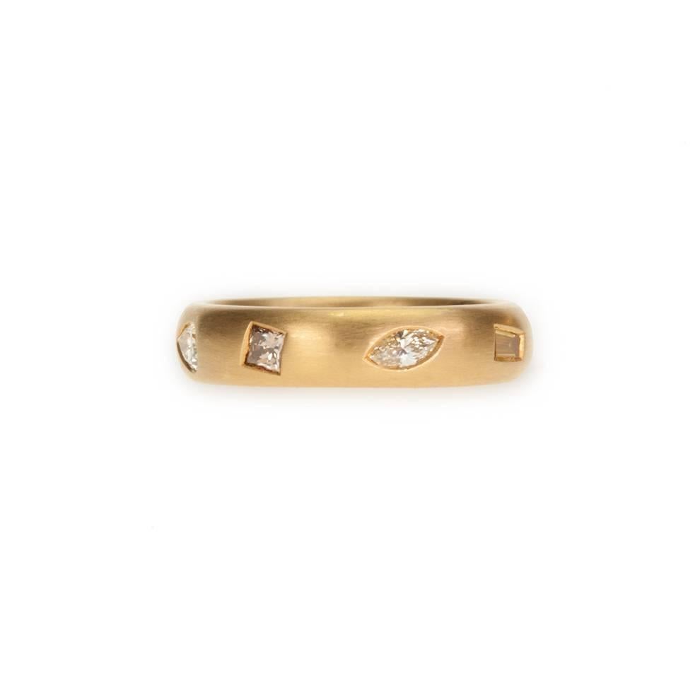 Modern 22 Karat Gold Band Featuring Eight White and Fancy Color Diamonds For Sale