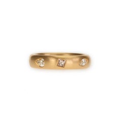 22 Karat Gold Band Featuring Eight White and Fancy Color Diamonds