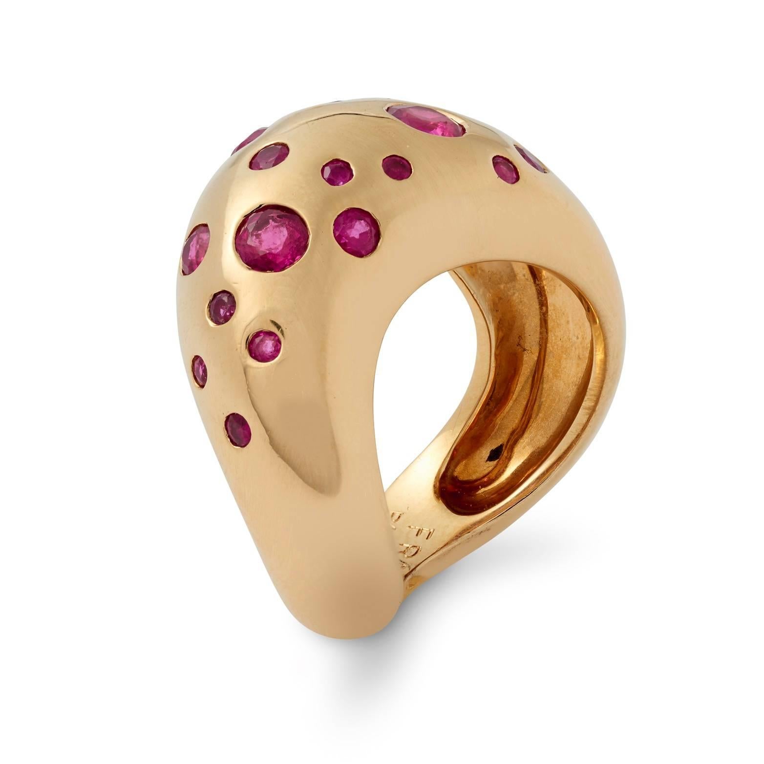 An unusual and appealing 18ct yellow gold curved bombe ring set with scatter set with rubies signed and numbered by Fred, Paris - S1985266