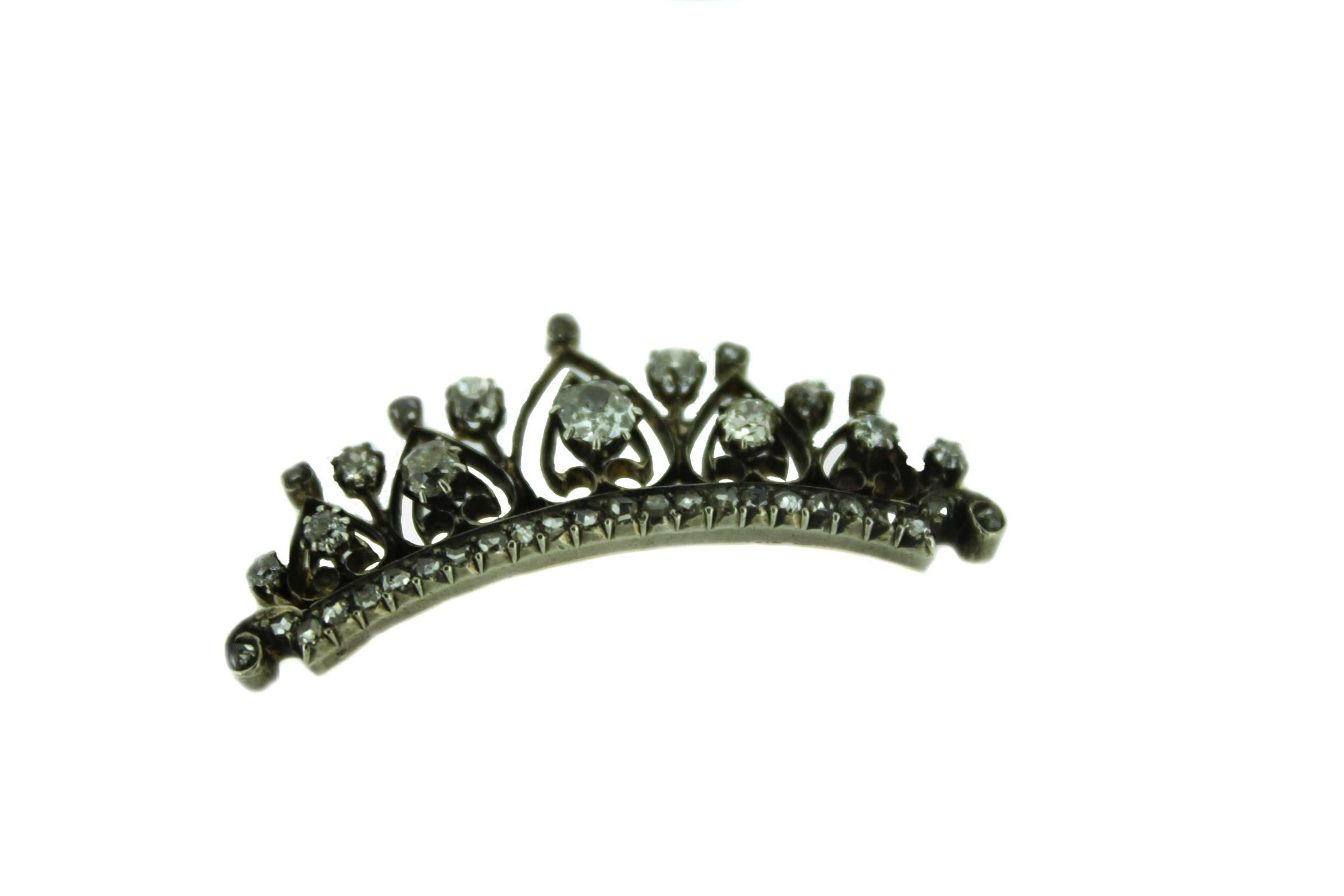 we are offering a time piece like no other,

The Tiara brooche is over 100 years old and decorated around with diamonds to sparkle like royalty!
The diamond are old european cut and are 1.50 carat and decorated around the edges are 24 rose cut