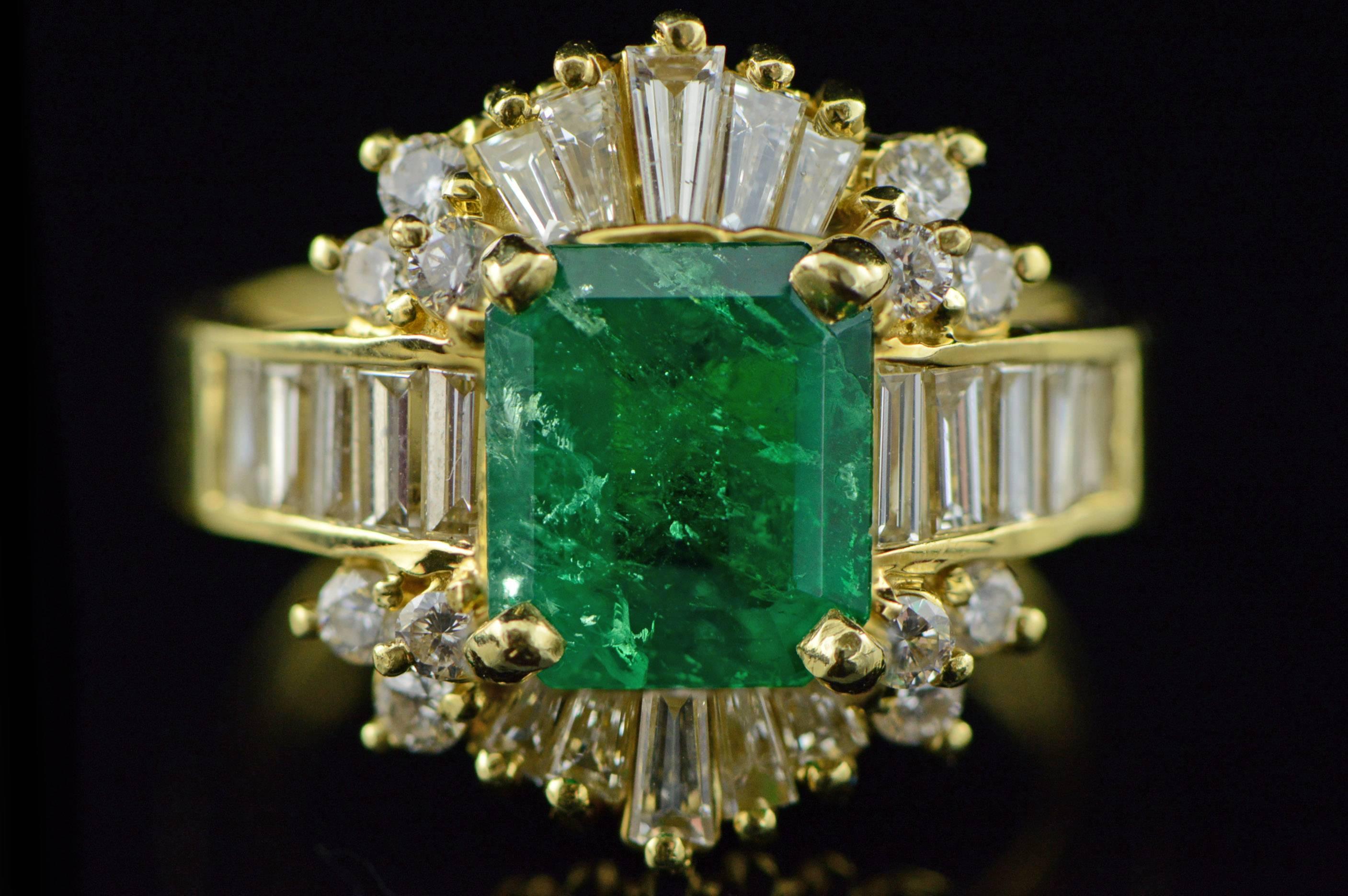 All diamonds are graded according to GIA grading standards. (When applicable)

·Item: 18K 2.17 Ct Emerald 1.47 Ctw Diamond Statement Ring Size 6 Yellow Gold

·Era: Vintage / 1980s

·Composition: 18k Gold Marked/Tested

·Center Gem Stone: 2.17Ct