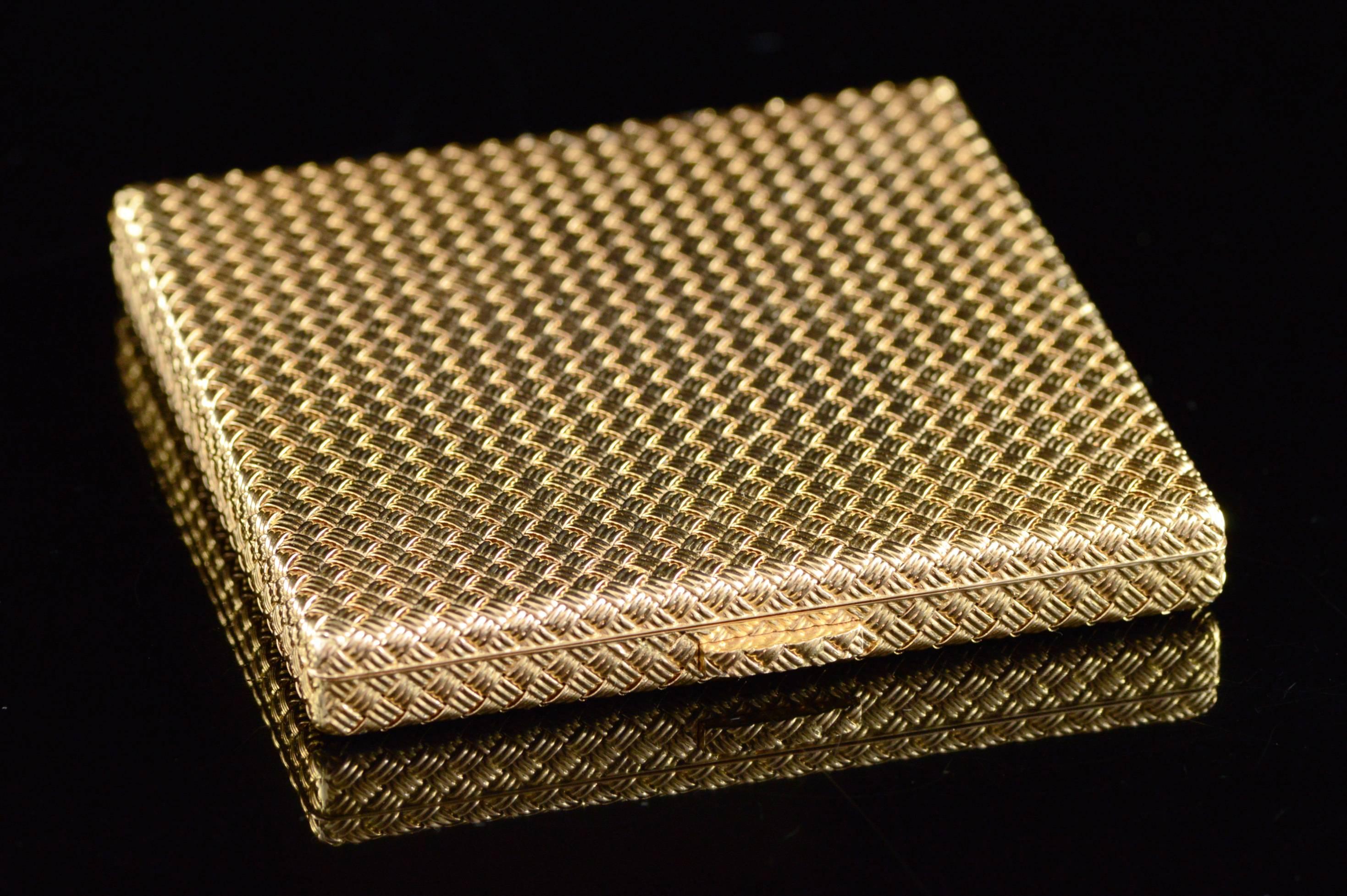This exquisitely constructed compact is the pinnacle of luxury. No expense was spared in its design or execution and you truly have to hold it in your own hand to appreciate the quality.

·Item: 18K Woven Boucheron Paris Compact Mirror Yellow