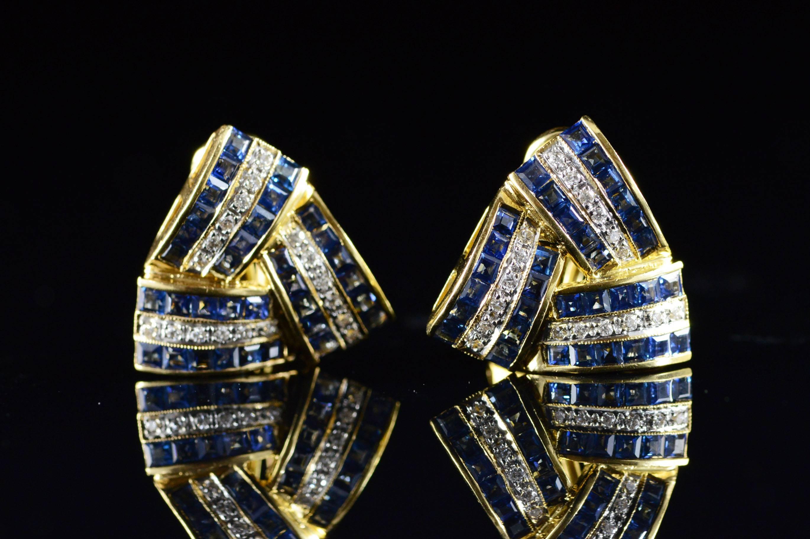 All diamonds are graded according to GIA grading standards.

·Item: 18K Classic 2.20 CTW Sapphire Diamond Woven Triangle French Clip Earrings Yellow Gold

·Era: Modern / 2000s

·Composition: 18k Gold Marked / Tested

·Gem Stone: 36x