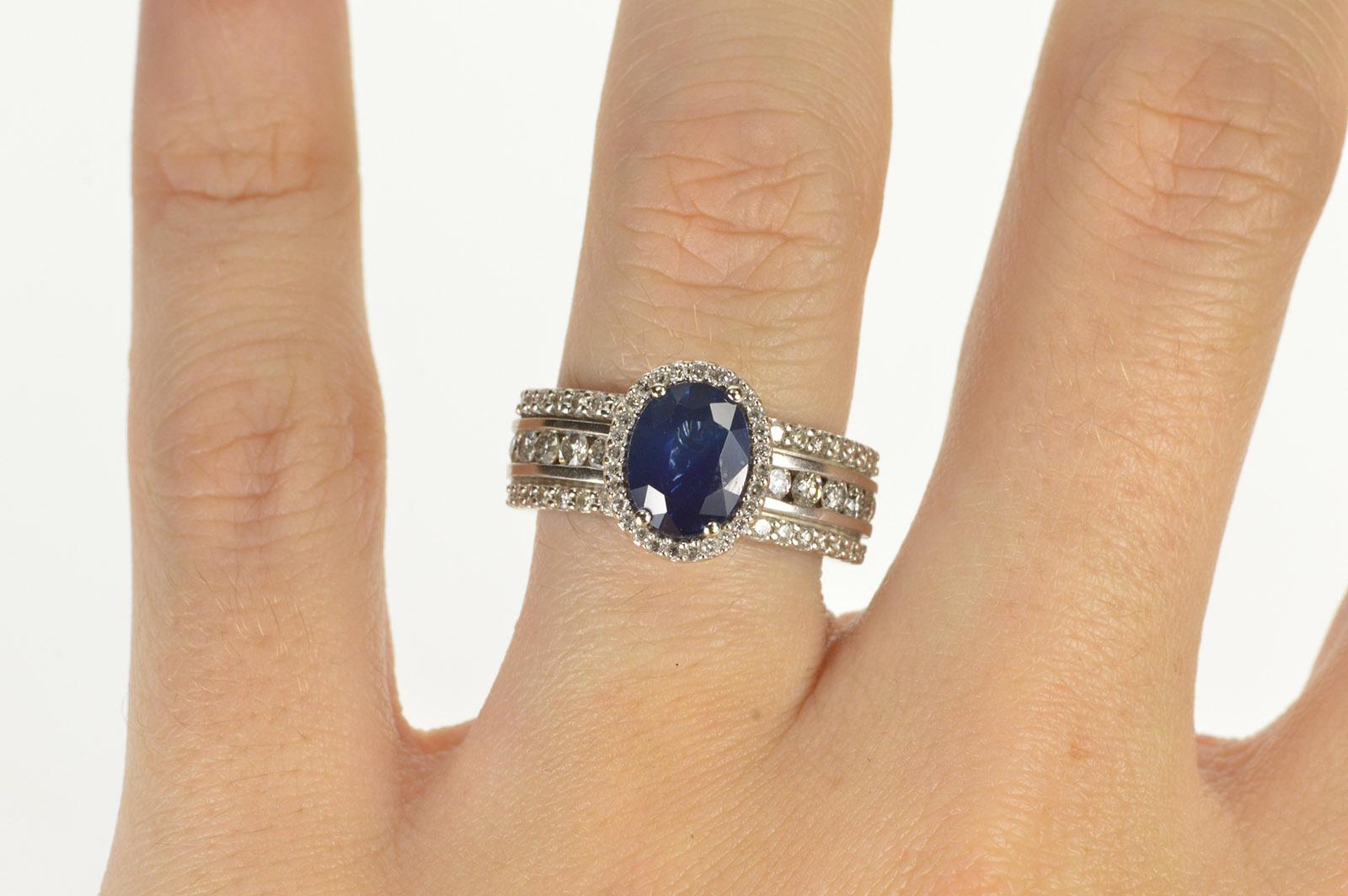 Oval Sapphire Diamond Halo Engagement Ring In Good Condition In Frederick, MD