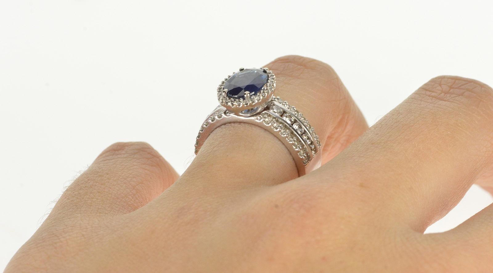 Women's Oval Sapphire Diamond Halo Engagement Ring
