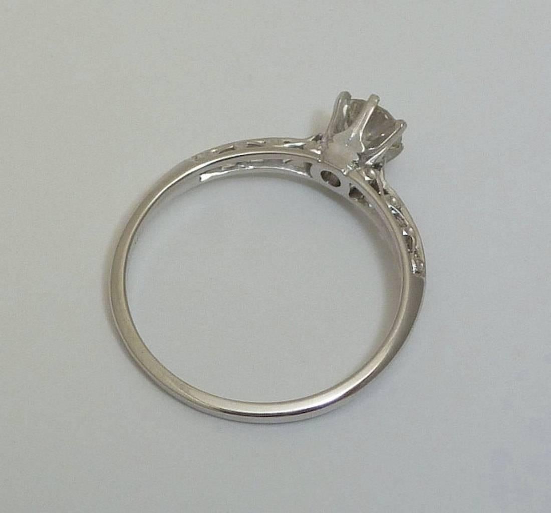 Edwardian 0.41 Carat Diamond Platinum Filigree Ring In Excellent Condition For Sale In Boston, MA