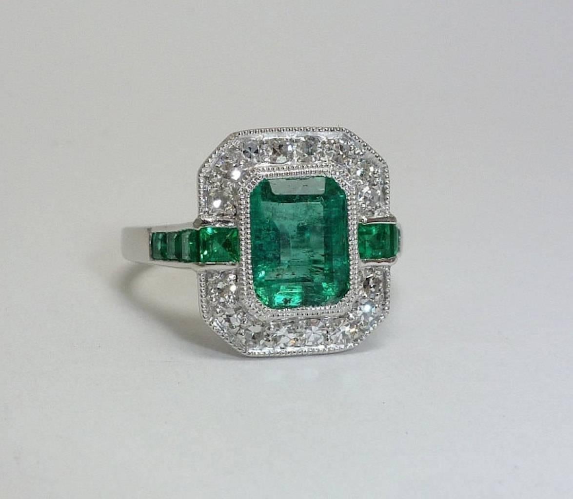 Elegant 1.84 carat Emerald Diamond Platinum Ring  In Excellent Condition For Sale In Boston, MA
