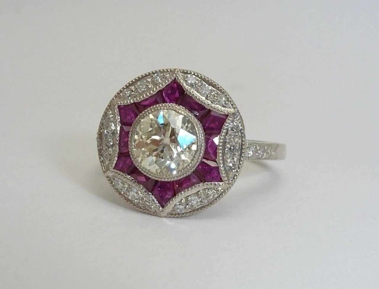Stunning 0.72 Carat Ruby Diamond Platinum Star Form Ring In Excellent Condition For Sale In Boston, MA