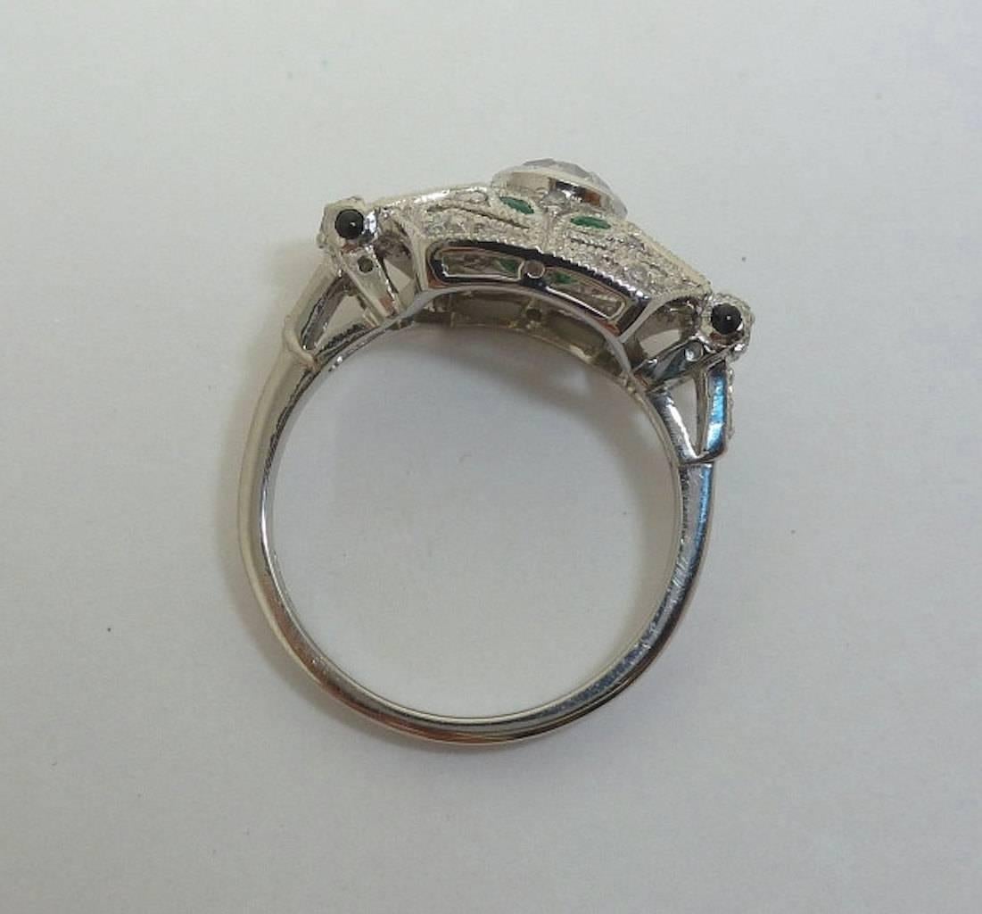 Women's Platinum French Art Deco Diamond, Onyx, & Emerald Ring For Sale