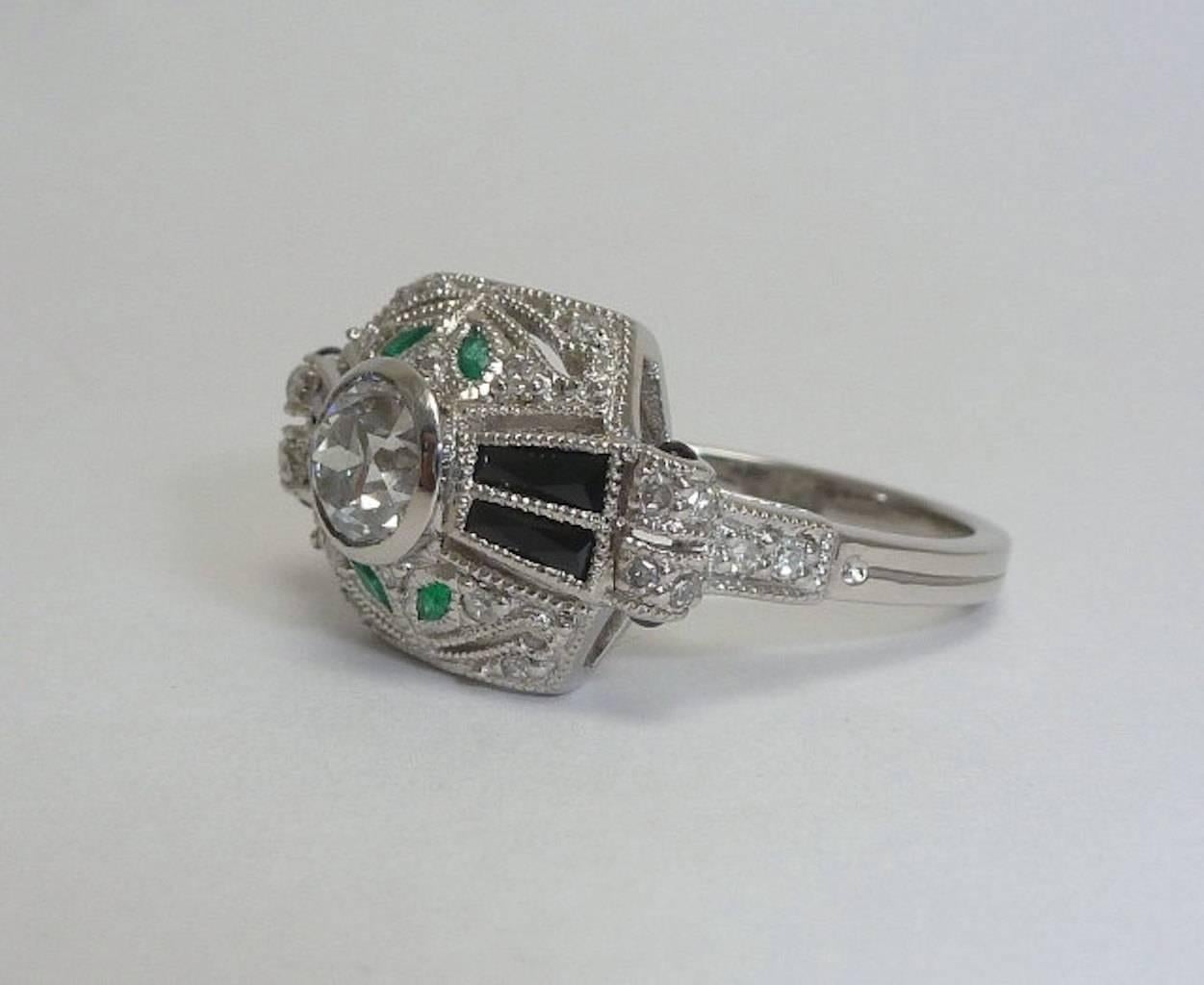 Platinum French Art Deco Diamond, Onyx, & Emerald Ring In Excellent Condition For Sale In Boston, MA