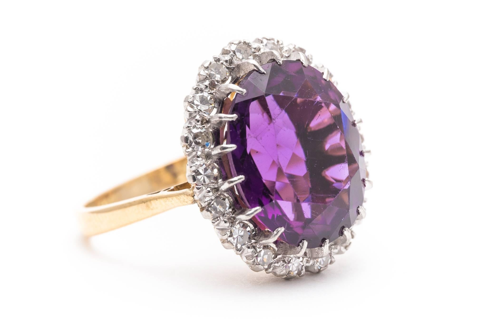 Beacon Hill Jewelers Presents:

An edwardian period amethyst and diamond ring in platinum and 18 karat yellow gold. Centered by a large natural amethyst this ring features a halo of sparkling antique Swiss cut diamonds set in luxurious platinum.

Of