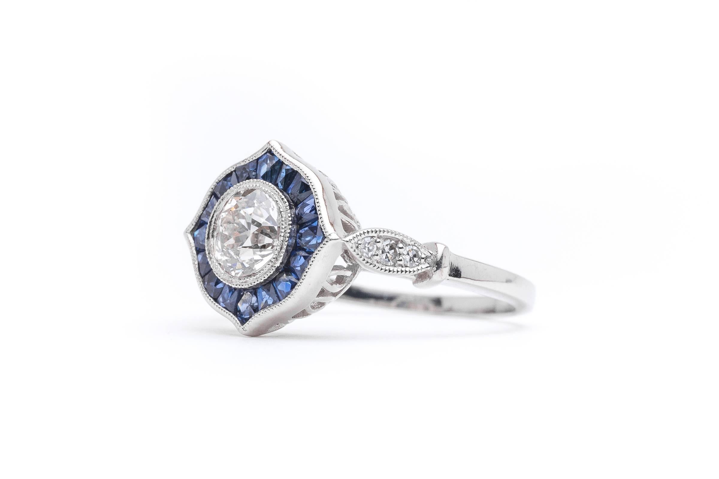 Sparkling 0.86 Carat Diamond and Sapphire Halo Ring in Platinum In Excellent Condition For Sale In Boston, MA