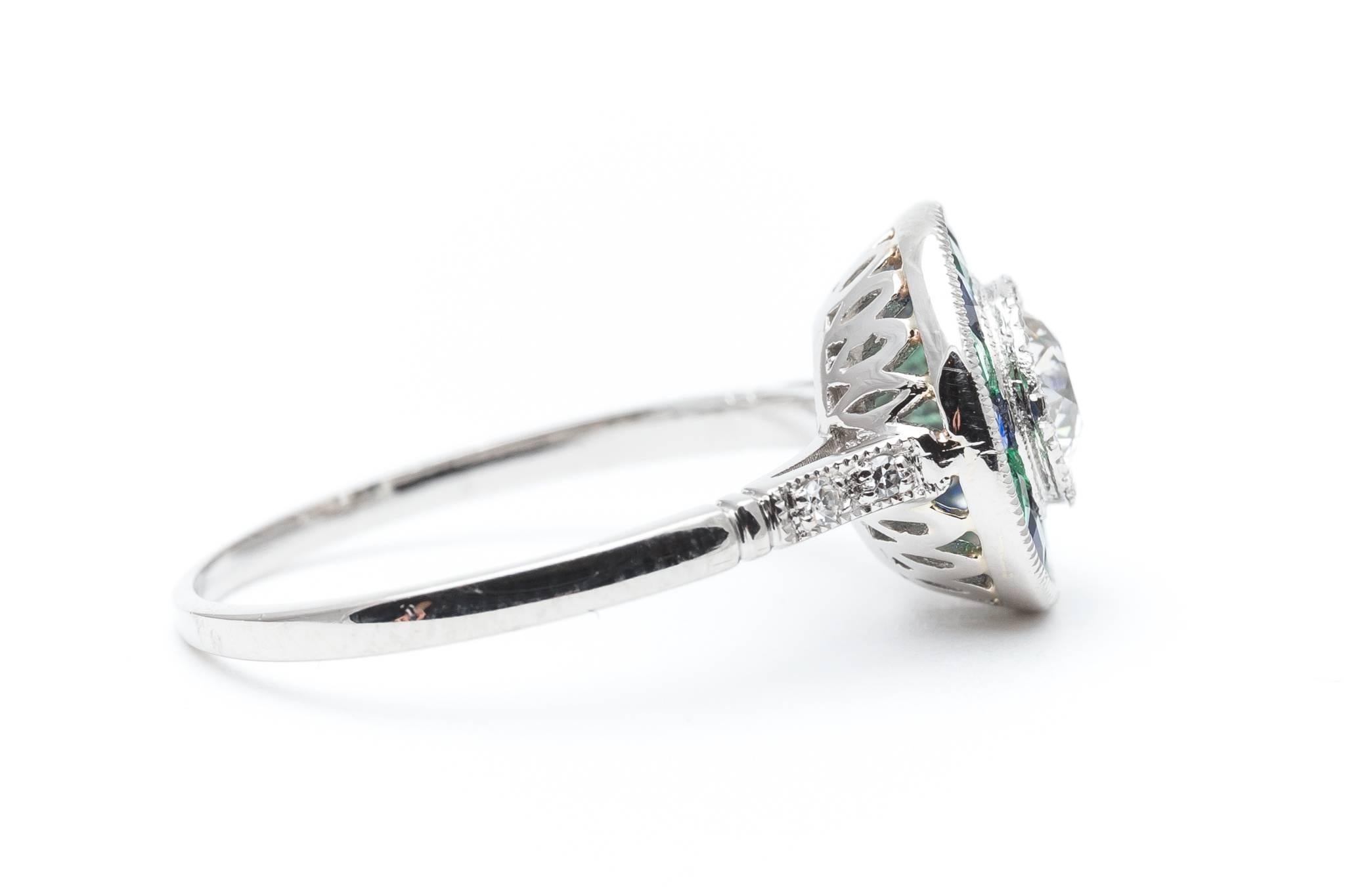 Women's Exciting Emerald, Sapphire and Diamond Target Ring in Platinum For Sale